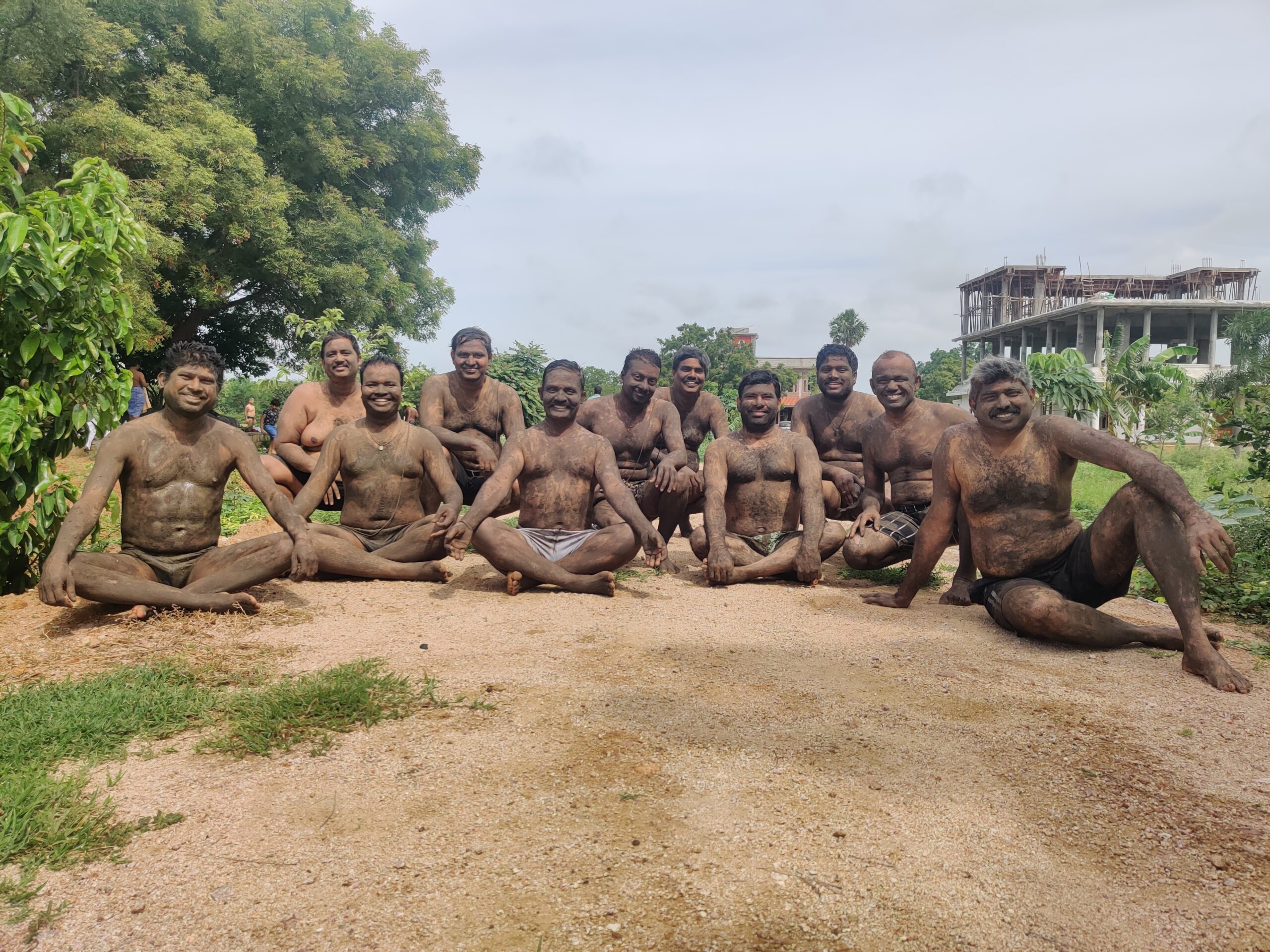 Volunteers take mud baths in the Goumaya Rasa Mud Bath even organized by GoPals.